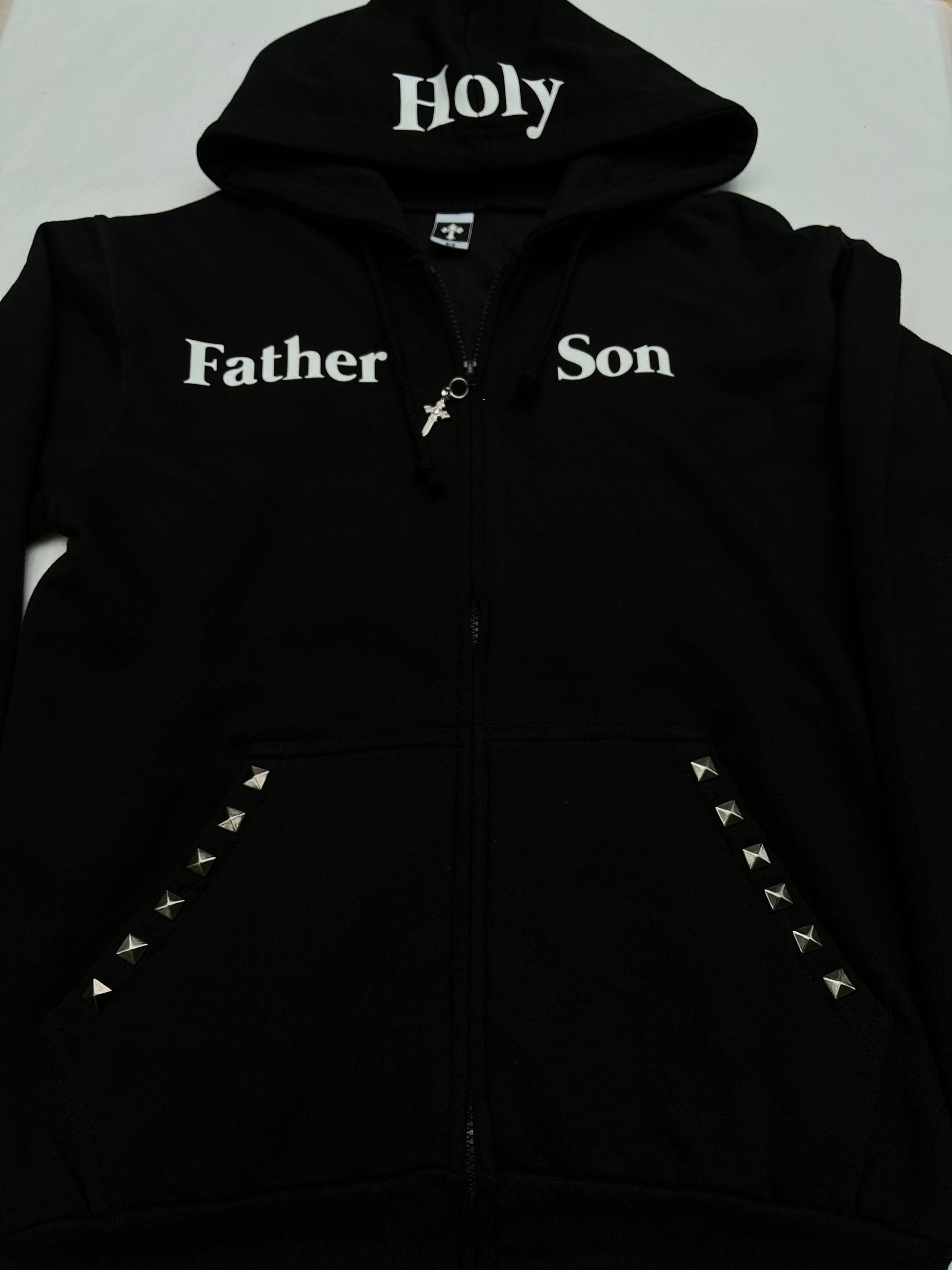 Black grunge father son hoodie with white text on a white background