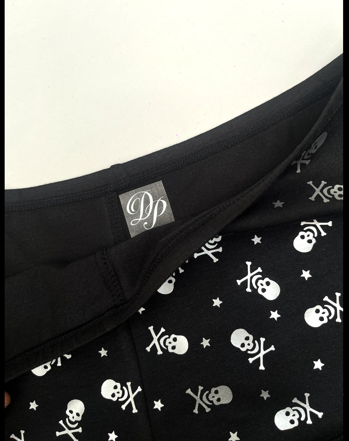 Black Low Rise Booty Shorts Silver All Over Star & Skull Design