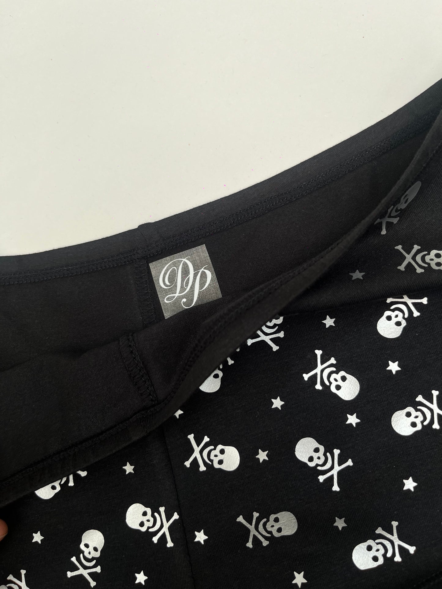 Pink Black Low Rise Booty Shorts All Over Star & Skull Design